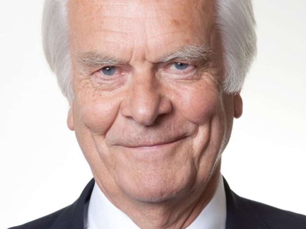 Lord David Owen posing for a picture