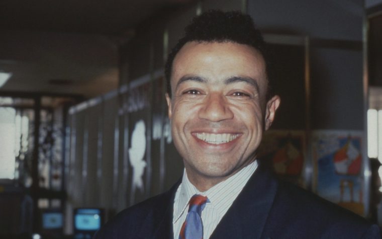 A photograph of young Paul Boateng smiling.