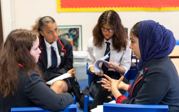 Students engaging in oracy in a classroom